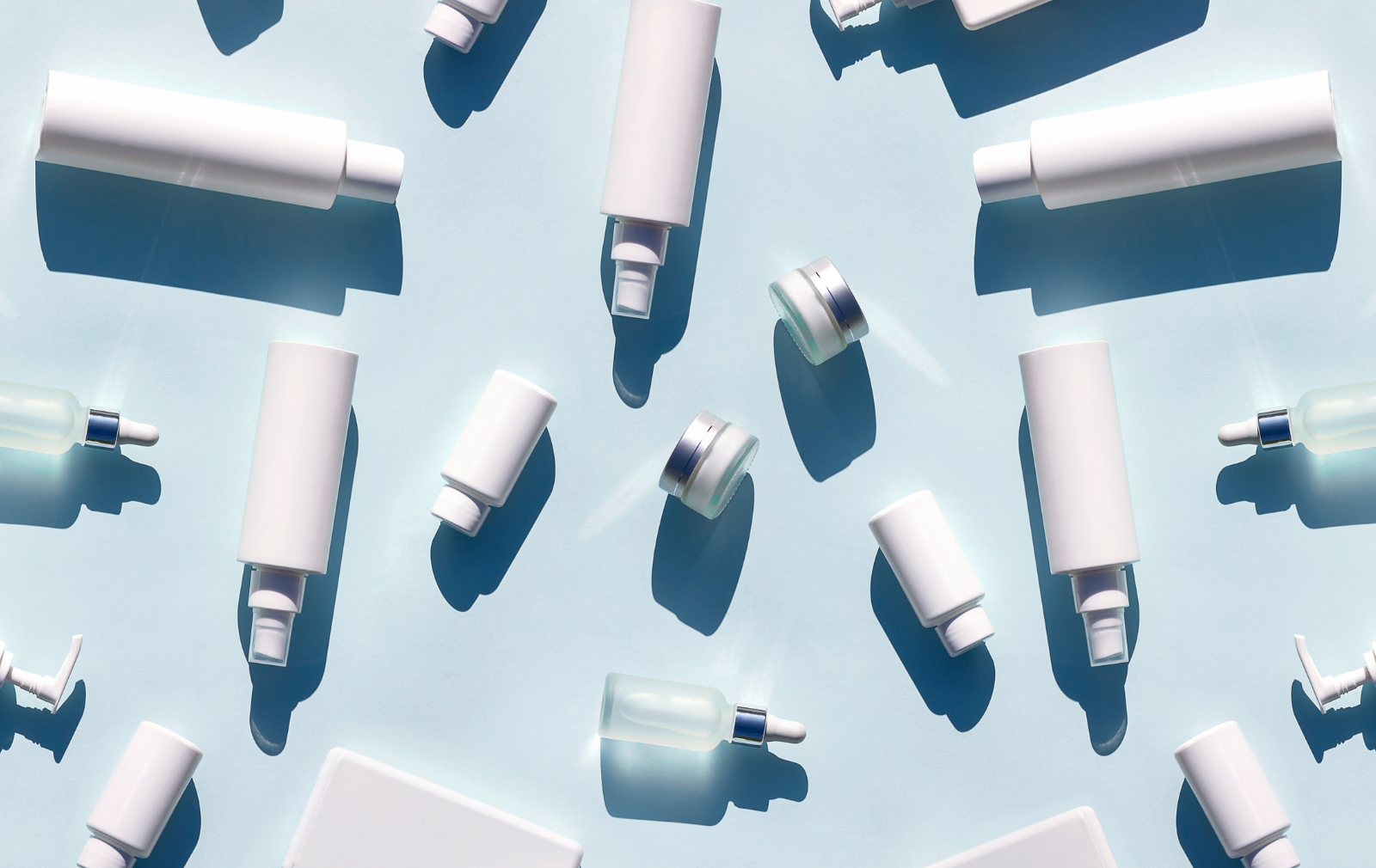 collection of beauty products on blue background
